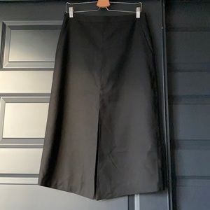 Meg black midi skirt with front slit. Size L.